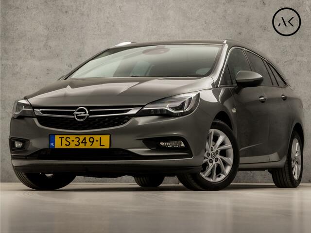 Opel ASTRA Sports Tourer 1.0 Innovation Sport (APPLE CARPLAY, GROOT NAVI, CLIMATE, LEDER, GETINT GLAS, SPORTSTOELEN, CAMERA, LM VELGEN, LED KOPLAMPEN, NIEUWSTAAT)