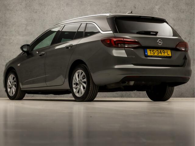 Opel ASTRA Sports Tourer 1.0 Innovation Sport (APPLE CARPLAY, GROOT NAVI, CLIMATE, LEDER, GETINT GLAS, SPORTSTOELEN, CAMERA, LM VELGEN, LED KOPLAMPEN, NIEUWSTAAT)