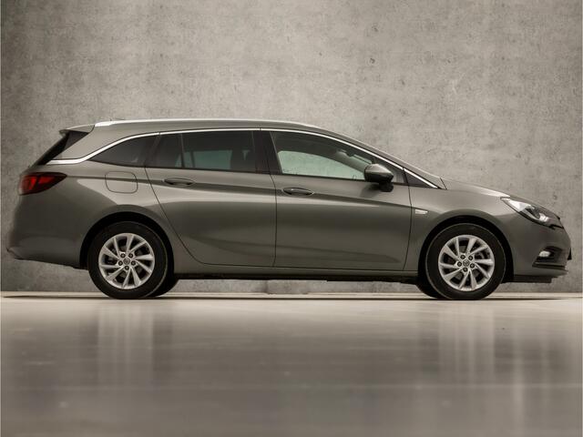 Opel ASTRA Sports Tourer 1.0 Innovation Sport (APPLE CARPLAY, GROOT NAVI, CLIMATE, LEDER, GETINT GLAS, SPORTSTOELEN, CAMERA, LM VELGEN, LED KOPLAMPEN, NIEUWSTAAT)
