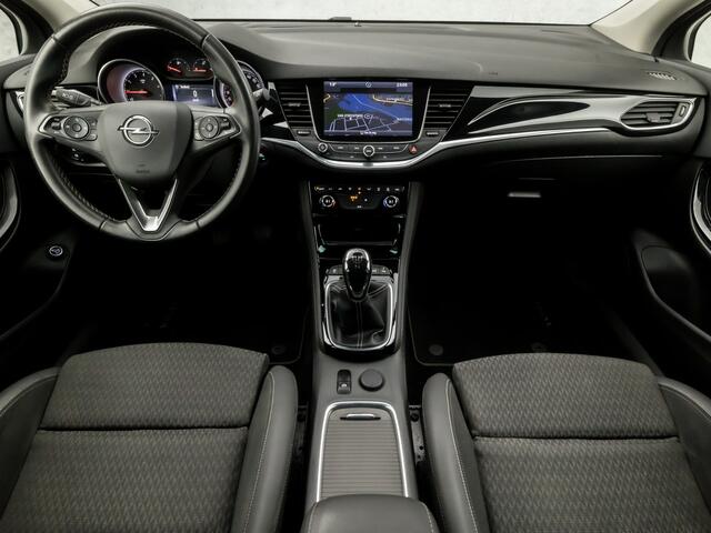 Opel ASTRA Sports Tourer 1.0 Innovation Sport (APPLE CARPLAY, GROOT NAVI, CLIMATE, LEDER, GETINT GLAS, SPORTSTOELEN, CAMERA, LM VELGEN, LED KOPLAMPEN, NIEUWSTAAT)