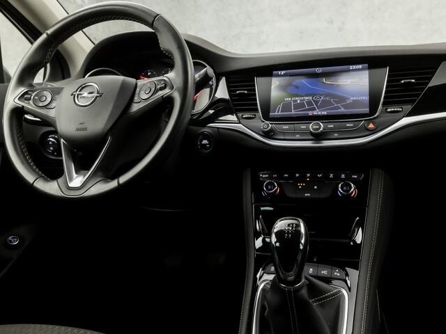 Opel ASTRA Sports Tourer 1.0 Innovation Sport (APPLE CARPLAY, GROOT NAVI, CLIMATE, LEDER, GETINT GLAS, SPORTSTOELEN, CAMERA, LM VELGEN, LED KOPLAMPEN, NIEUWSTAAT)