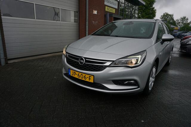 Opel ASTRA Sports Tourer 1.0 BUSINESS+ ORIGINEEL NEDERLANDS NAVIGATIE ANDROID/APPLECARPLAY TREKHAAK ECC AIRCO CRUISECONTROL PARKEERSENSOREN V+A BLUETOOTH CHROOM 4X ELECTR.RAMEN/SPIEGELS