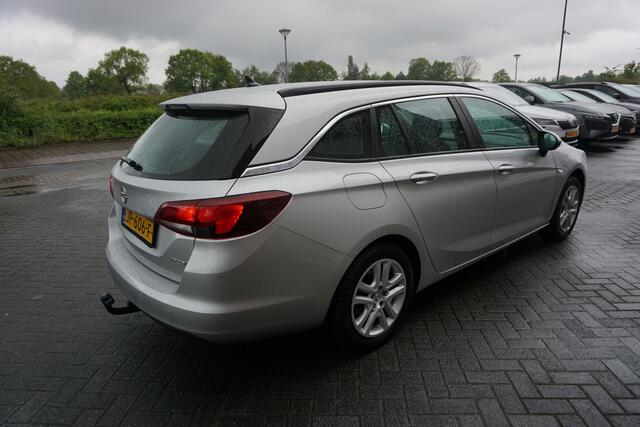 Opel ASTRA Sports Tourer 1.0 BUSINESS+ ORIGINEEL NEDERLANDS NAVIGATIE ANDROID/APPLECARPLAY TREKHAAK ECC AIRCO CRUISECONTROL PARKEERSENSOREN V+A BLUETOOTH CHROOM 4X ELECTR.RAMEN/SPIEGELS