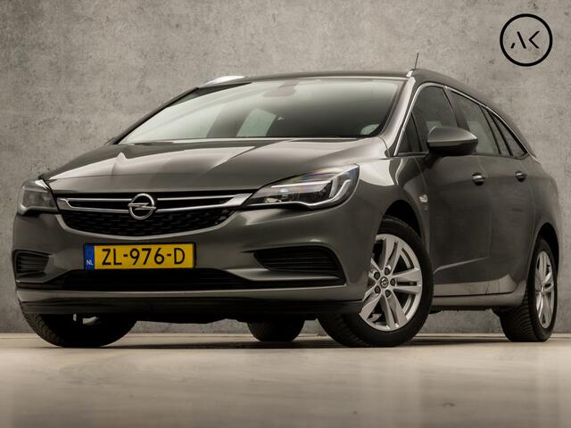 Opel ASTRA Sports Tourer 1.4 Turbo 120 Jaar Edition 150Pk (APPLE CARPLAY, NAVIGATIE, TREKHAAK, CRUISE, SPORTSTOELEN, LM VELGEN, NIEUWE APK, NIEUWSTAAT)