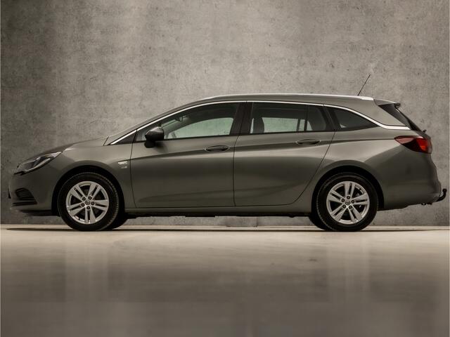 Opel ASTRA Sports Tourer 1.4 Turbo 120 Jaar Edition 150Pk (APPLE CARPLAY, NAVIGATIE, TREKHAAK, CRUISE, SPORTSTOELEN, LM VELGEN, NIEUWE APK, NIEUWSTAAT)