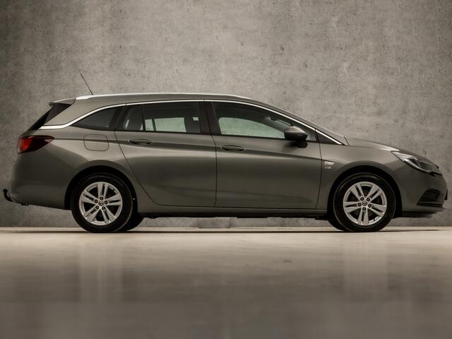 Opel ASTRA Sports Tourer 1.4 Turbo 120 Jaar Edition 150Pk (APPLE CARPLAY, NAVIGATIE, TREKHAAK, CRUISE, SPORTSTOELEN, LM VELGEN, NIEUWE APK, NIEUWSTAAT)