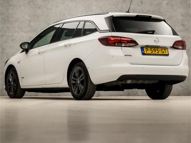 Opel ASTRA Sports Tourer 1.2 Design & Tech (APPLE CARPLAY, NAVIGATIE, CAMERA, CLIMATE, GETINT GLAS, SPORTSTOELEN, PARKEERSENSOREN, LED KOPLAMPEN, NIEUWE APK, NIEUWSTAAT)