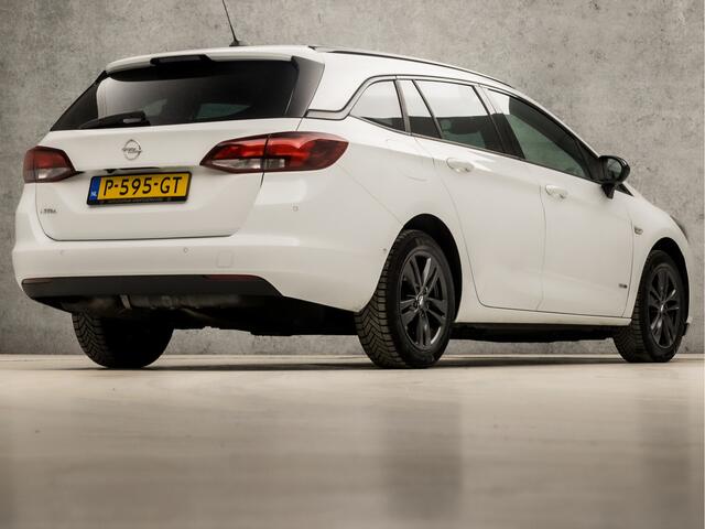 Opel ASTRA Sports Tourer 1.2 Design & Tech (APPLE CARPLAY, NAVIGATIE, CAMERA, CLIMATE, GETINT GLAS, SPORTSTOELEN, PARKEERSENSOREN, LED KOPLAMPEN, NIEUWE APK, NIEUWSTAAT)