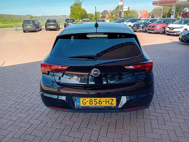 Opel ASTRA 1.0 Turbo 120 Jaar Edition, Airco(automatisch), Carplay/Android auto, Bluetooth, Navigatie, Camera, Parkeersensoren, Cruise control, Stoelverwarming, Stuurwiel verwarmd, Dimlicht automatisch, Regensensor, Elektrische ramen en spiegels, Centrale vergrendel
