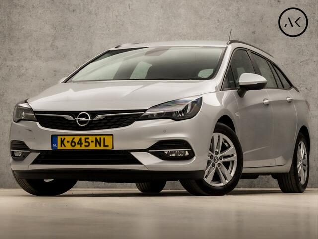 Opel ASTRA Sports Tourer 1.4 Sport 146Pk Automaat (APPLE CARPLAY, NAVIGATIE, CLIMATE, CAMERA, SPORTSTOELEN, LM VELGEN, PARKEERSENSOREN, CRUISE, NIEUWSTAAT)