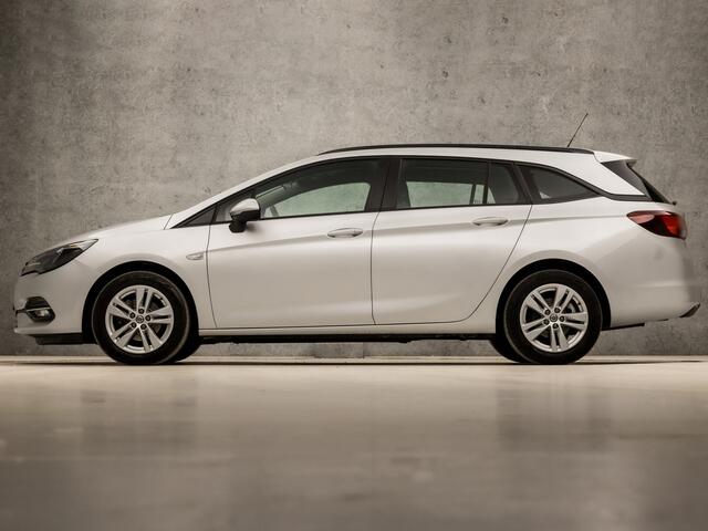 Opel ASTRA Sports Tourer 1.4 Sport 146Pk Automaat (APPLE CARPLAY, NAVIGATIE, CLIMATE, CAMERA, SPORTSTOELEN, LM VELGEN, PARKEERSENSOREN, CRUISE, NIEUWSTAAT)