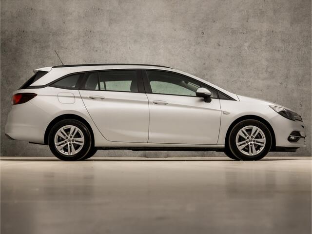 Opel ASTRA Sports Tourer 1.4 Sport 146Pk Automaat (APPLE CARPLAY, NAVIGATIE, CLIMATE, CAMERA, SPORTSTOELEN, LM VELGEN, PARKEERSENSOREN, CRUISE, NIEUWSTAAT)