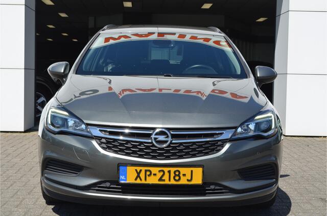 Opel ASTRA Sports Tourer 1.0 Turbo Online Edition Carplay | Navi | DAB | Cruise | Parkeersensor voor + achter | NL auto