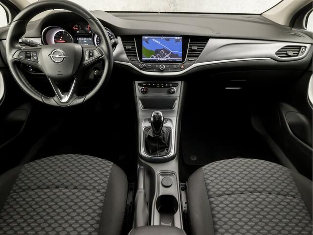 Opel ASTRA Sports Tourer 1.0 Sport (APPLE CARPLAY, GROOT NAVI, GETINT GLAS, TREKHAAK, PARKEERSENSOREN, SPORTSTOELEN, CRUISE, LM VELGEN, NIEUWE APK, NIEUWSTAAT)