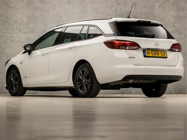 Opel ASTRA Sports Tourer 1.2 Design & Tech (APPLE CARPLAY, GROOT NAVI, CAMERA, ADAPTIVE CRUISE, LEDER, GETINT GLAS, SPORTSTOELEN, LED KOPLAMPEN, CRUISE, PARKEERSENSOREN, NIEUWE APK, NIEUWSTAAT)