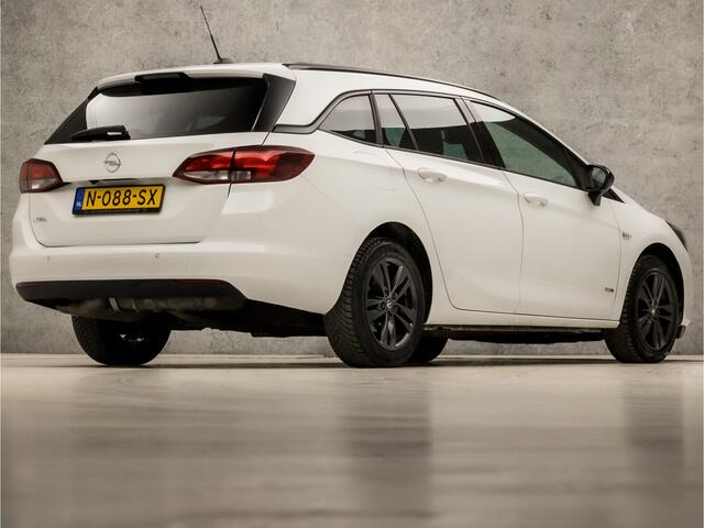 Opel ASTRA Sports Tourer 1.2 Design & Tech (APPLE CARPLAY, GROOT NAVI, CAMERA, ADAPTIVE CRUISE, LEDER, GETINT GLAS, SPORTSTOELEN, LED KOPLAMPEN, CRUISE, PARKEERSENSOREN, NIEUWE APK, NIEUWSTAAT)