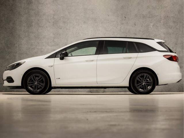 Opel ASTRA Sports Tourer 1.2 Design & Tech (APPLE CARPLAY, NAVIGATIE, CAMERA, LEDER, GETINT GLAS, SPORTSTOELEN, PARKEERSENSOREN, NIEUWE APK, CRUISE, NIEUWSTAAT)