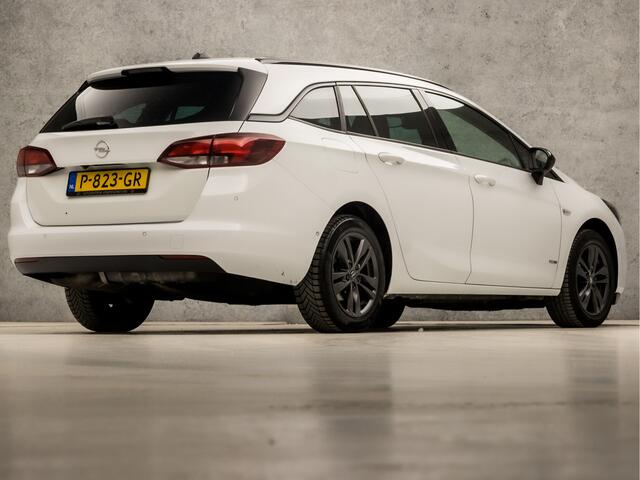 Opel ASTRA Sports Tourer 1.2 Design & Tech (APPLE CARPLAY, NAVIGATIE, CAMERA, LEDER, GETINT GLAS, SPORTSTOELEN, PARKEERSENSOREN, NIEUWE APK, CRUISE, NIEUWSTAAT)