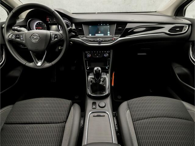 Opel ASTRA Sports Tourer 1.2 Design & Tech (APPLE CARPLAY, NAVIGATIE, CAMERA, LEDER, GETINT GLAS, SPORTSTOELEN, PARKEERSENSOREN, NIEUWE APK, CRUISE, NIEUWSTAAT)