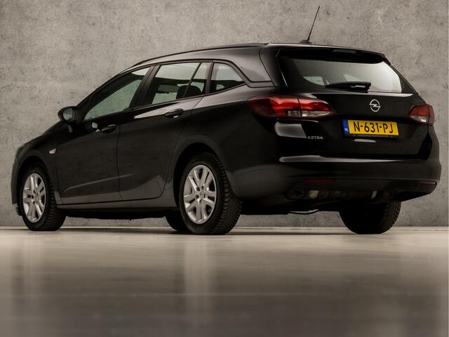 Opel ASTRA Sports Tourer 1.4 Business Sport 146Pk Automaat (APPLE CARPLAY, NAVIGATIE, CRUISE, SPORTSTOELEN, PARKEERSENSOREN, NIEUWE APK, DAB+, NIEUWSTAAT)