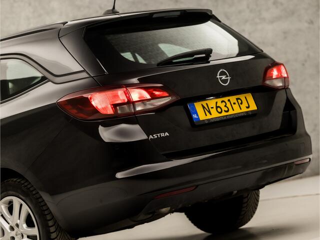Opel ASTRA Sports Tourer 1.4 Business Sport 146Pk Automaat (APPLE CARPLAY, NAVIGATIE, CRUISE, SPORTSTOELEN, PARKEERSENSOREN, NIEUWE APK, DAB+, NIEUWSTAAT)