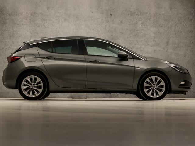 Opel ASTRA 1.4 Innovation 150Pk (APPLE CARPLAY, GROOT NAVI, STUUR/STOELVERWARMING, ADAPTIVE CRUISE, LEDER, SPORTSTOELEN, CAMERA, LM VELGEN, GETINT GLAS, NIEUWSTAAT)