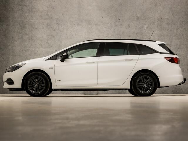 Opel ASTRA Sports Tourer 1.2 Sport (APPLE CARPLAY, NAVIGATIE, CLIMATE, CAMERA, ADAPTIVE CRUISE, SPORTSTOELEN, GETINT GLAS, LEDER, TREKHAAK, NIEUWSTAAT)