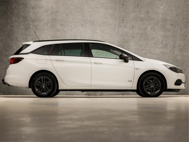 Opel ASTRA Sports Tourer 1.2 Sport (APPLE CARPLAY, NAVIGATIE, CLIMATE, CAMERA, ADAPTIVE CRUISE, SPORTSTOELEN, GETINT GLAS, LEDER, TREKHAAK, NIEUWSTAAT)
