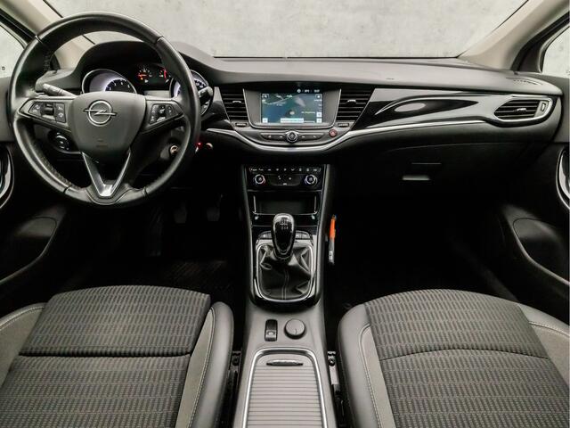 Opel ASTRA Sports Tourer 1.2 Sport (APPLE CARPLAY, NAVIGATIE, CLIMATE, CAMERA, ADAPTIVE CRUISE, SPORTSTOELEN, GETINT GLAS, LEDER, TREKHAAK, NIEUWSTAAT)