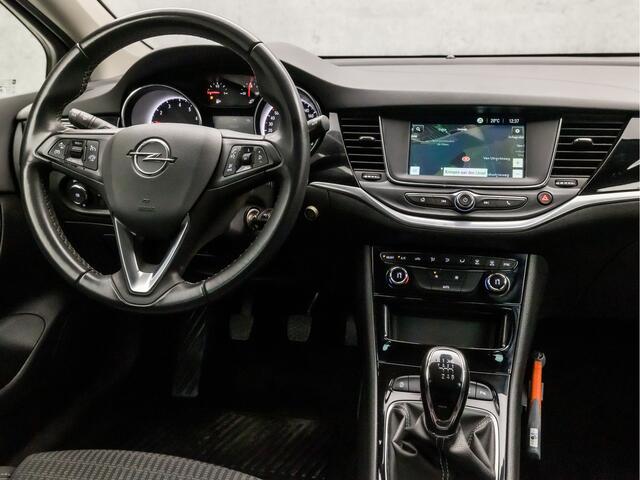 Opel ASTRA Sports Tourer 1.2 Sport (APPLE CARPLAY, NAVIGATIE, CLIMATE, CAMERA, ADAPTIVE CRUISE, SPORTSTOELEN, GETINT GLAS, LEDER, TREKHAAK, NIEUWSTAAT)