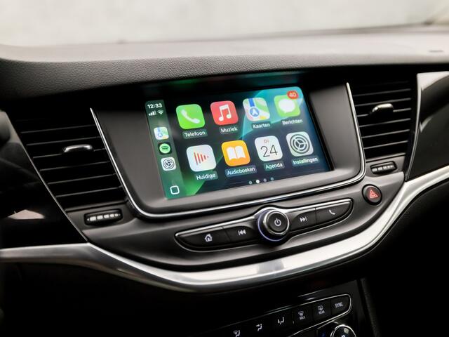 Opel ASTRA Sports Tourer 1.2 Sport (APPLE CARPLAY, NAVIGATIE, CLIMATE, CAMERA, ADAPTIVE CRUISE, SPORTSTOELEN, GETINT GLAS, LEDER, TREKHAAK, NIEUWSTAAT)