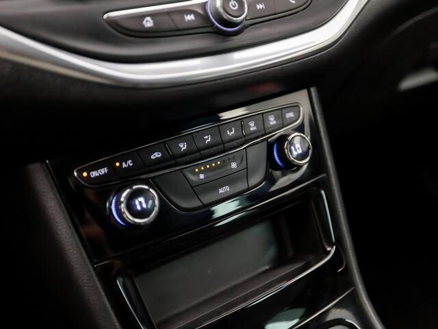 Opel ASTRA Sports Tourer 1.2 Sport (APPLE CARPLAY, NAVIGATIE, CLIMATE, CAMERA, ADAPTIVE CRUISE, SPORTSTOELEN, GETINT GLAS, LEDER, TREKHAAK, NIEUWSTAAT)