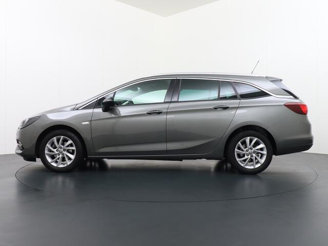 Opel ASTRA Sports Tourer T 111pk Navi Apple/Android Elek.klep Keyless Lane-dep. CruiseControl Pdc-a+v Ecc Licht-/Zichtpakket Bluetooth Isofix 4xElek.Ramen Mistlampen Usb 16''LM Dealer Onderhouden 1.2 Turbo Business Elegance