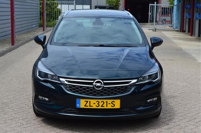 Opel ASTRA Sports Tourer 1.4 Turbo 120 Jaar Edition O.a: Navi, Clima, Cruise, PDC, Carplay, Rijklaar, Etc. All-in prijs!