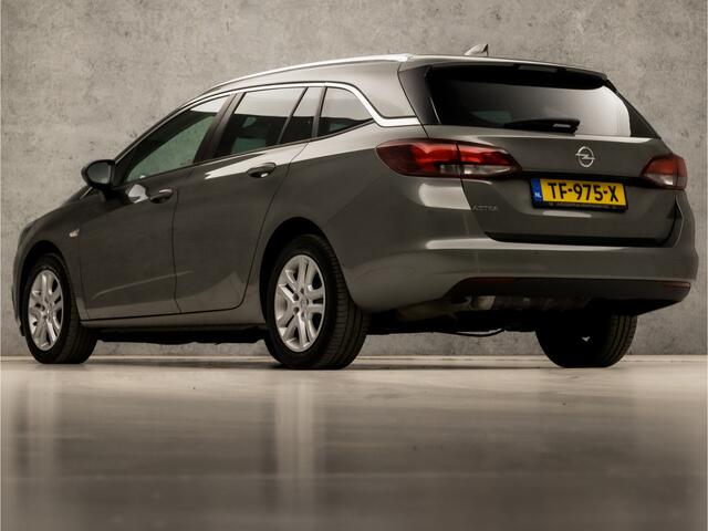 Opel ASTRA Sports Tourer 1.0 Sportline (APPLE CARPLAY, NAVIGATIE, GETINT GLAS, CHROOM PAKKET, XENON, SPORTSTOELEN, BLUETOOTH, CRUISE CONTROL, NIEUWSTAAT)