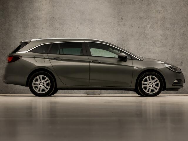 Opel ASTRA Sports Tourer 1.0 Sportline (APPLE CARPLAY, NAVIGATIE, GETINT GLAS, CHROOM PAKKET, XENON, SPORTSTOELEN, BLUETOOTH, CRUISE CONTROL, NIEUWSTAAT)