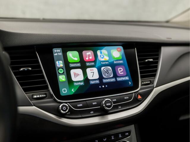 Opel ASTRA Sports Tourer 1.0 Sportline (APPLE CARPLAY, NAVIGATIE, GETINT GLAS, CHROOM PAKKET, XENON, SPORTSTOELEN, BLUETOOTH, CRUISE CONTROL, NIEUWSTAAT)