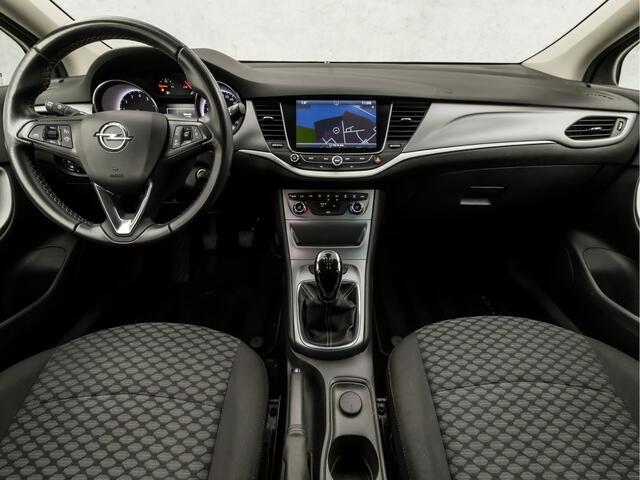 Opel ASTRA Sports Tourer 1.0 Online Edition (APPLE CARPLAY, NAVIGATIE, TREKHAAK, GETINT GLAS, CHROOM PAKKET, XENON, SPORTSTOELEN, BLUETOOTH, CRUISE CONTROL, NIEUWSTAAT)