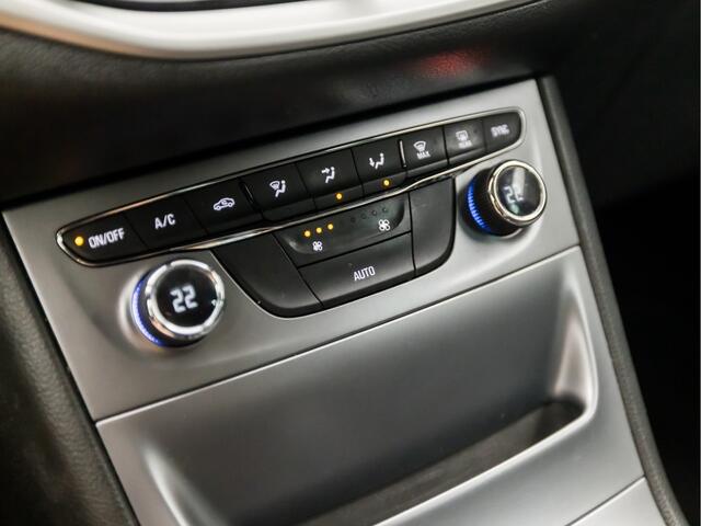 Opel ASTRA Sports Tourer 1.0 Online Edition (APPLE CARPLAY, NAVIGATIE, TREKHAAK, GETINT GLAS, CHROOM PAKKET, XENON, SPORTSTOELEN, BLUETOOTH, CRUISE CONTROL, NIEUWSTAAT)