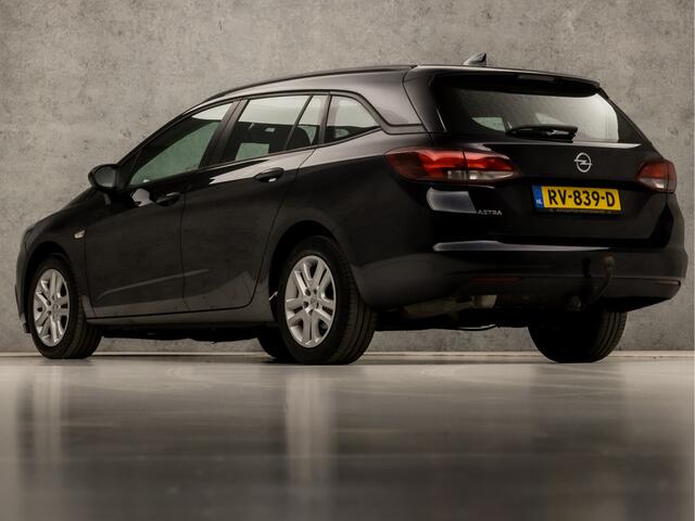 Opel ASTRA Sports Tourer 1.0 Sportline (GROOT NAVI, APPLE CARPLAY, CLIMATE, TREKHAAK, XENON, SPORTSTOELEN, BLUETOOTH, CRUISE CONTROL, NIEUWSTAAT)