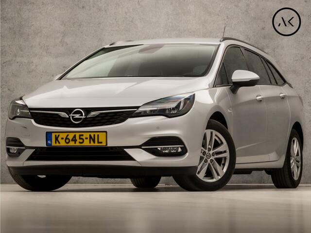 Opel ASTRA Sports Tourer 1.4 Sport 146Pk Automaat (APPLE CARPLAY, NAVIGATIE, CLIMATE, CAMERA, GETINT GLAS, SPORTSTOELEN, LM VELGEN, PARKEERSENSOREN, CRUISE, NIEUWSTAAT)