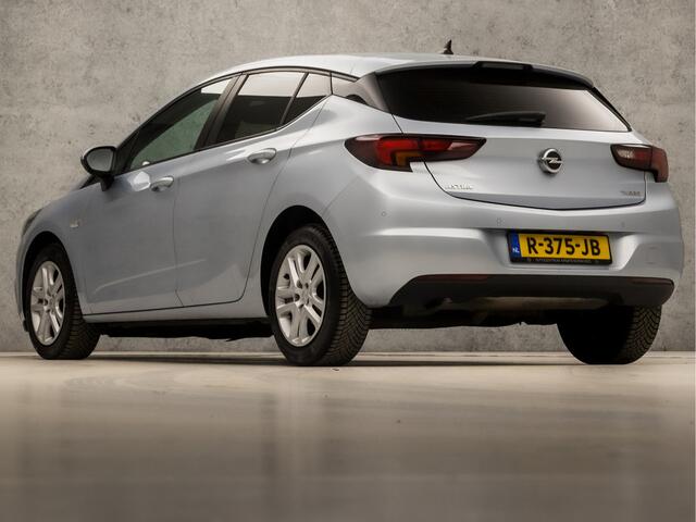 Opel ASTRA 1.4 Turbo (APPLE CARPLAY, GROOT NAVI, STUUR/STOELVERWARMING, ADAPTIVE CRUISE, GETINT GLAS, SPORTSTOELEN, PARKEERSENSOREN, LM VELGEN, NIEUWE APK, NIEUWSTAAT)