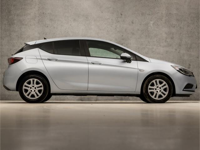 Opel ASTRA 1.4 Turbo (APPLE CARPLAY, GROOT NAVI, STUUR/STOELVERWARMING, ADAPTIVE CRUISE, GETINT GLAS, SPORTSTOELEN, PARKEERSENSOREN, LM VELGEN, NIEUWE APK, NIEUWSTAAT)