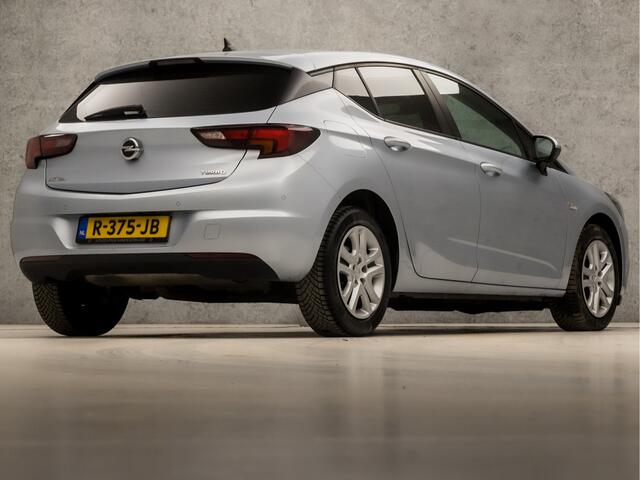 Opel ASTRA 1.4 Turbo (APPLE CARPLAY, GROOT NAVI, STUUR/STOELVERWARMING, ADAPTIVE CRUISE, GETINT GLAS, SPORTSTOELEN, PARKEERSENSOREN, LM VELGEN, NIEUWE APK, NIEUWSTAAT)