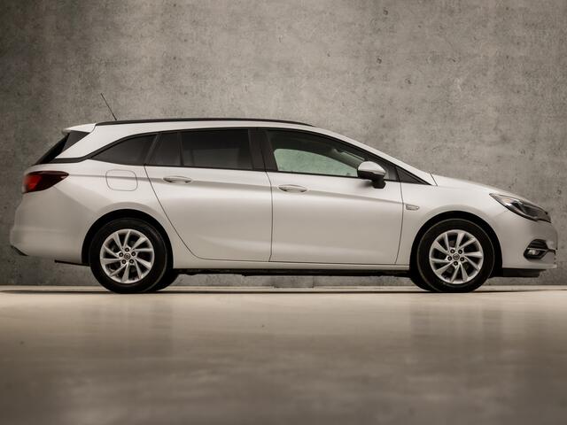 Opel ASTRA Sports Tourer 1.4 Sport 146Pk Automaat (APPLE CARPLAY, NAVIGATIE, CAMERA, CLIMATE, GETINT GLAS, SPORTSTOELEN, PARKEERSENSOREN, LM VELGEN, NIEUWE APK, NIEUWSTAAT)