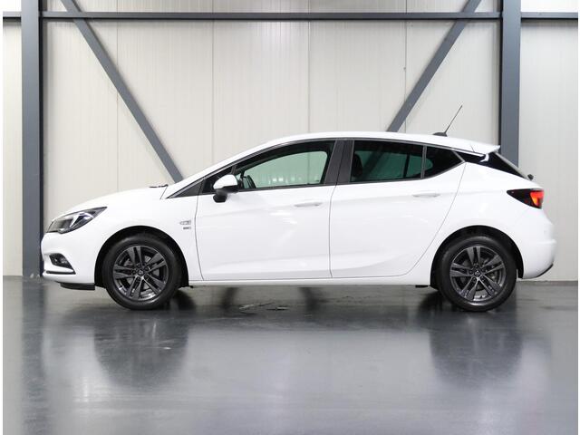 Opel ASTRA 1.0 105PK Turbo 120 Jaar Edition | AppleCarPlay/AndroidAuto | Climate Control | Cruise Control | Navigatie | Parkeersensoren VOOR + achter | Isofix | Privacy Glass |