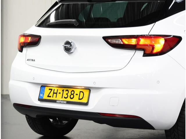 Opel ASTRA 1.0 105PK Turbo 120 Jaar Edition | AppleCarPlay/AndroidAuto | Climate Control | Cruise Control | Navigatie | Parkeersensoren VOOR + achter | Isofix | Privacy Glass |