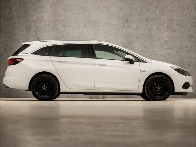 Opel ASTRA Sports Tourer 1.2 Elegance (APPLE CARPLAY, NAVIGATIE, CLIMATE, CAMERA, ADAPTIVE CRUISE, LEDER, SPORTSTOELEN, GETINT GLAS, LM VELGEN, NIEUWSTAAT)