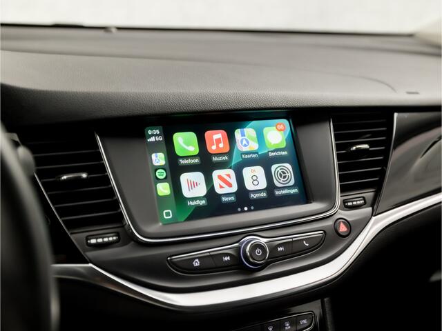 Opel ASTRA Sports Tourer 1.2 Elegance (APPLE CARPLAY, NAVIGATIE, CLIMATE, CAMERA, ADAPTIVE CRUISE, LEDER, SPORTSTOELEN, GETINT GLAS, LM VELGEN, NIEUWSTAAT)