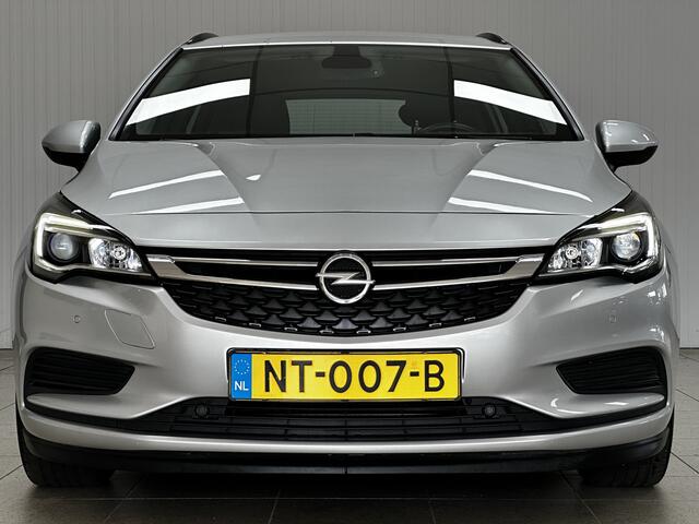 Opel ASTRA Sports Tourer 1.0 Online Edition/ LED Dagrijverl./ DAB+/ Apple+Android/ Clima/ Navi/ Cruise/ Bluetooth/ Multi.LEDER.Stuur/ Elek.Pakket/ Isofix/ PDC V+A.